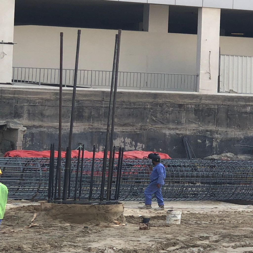 Seddiqi Holding HQ facade at dusk