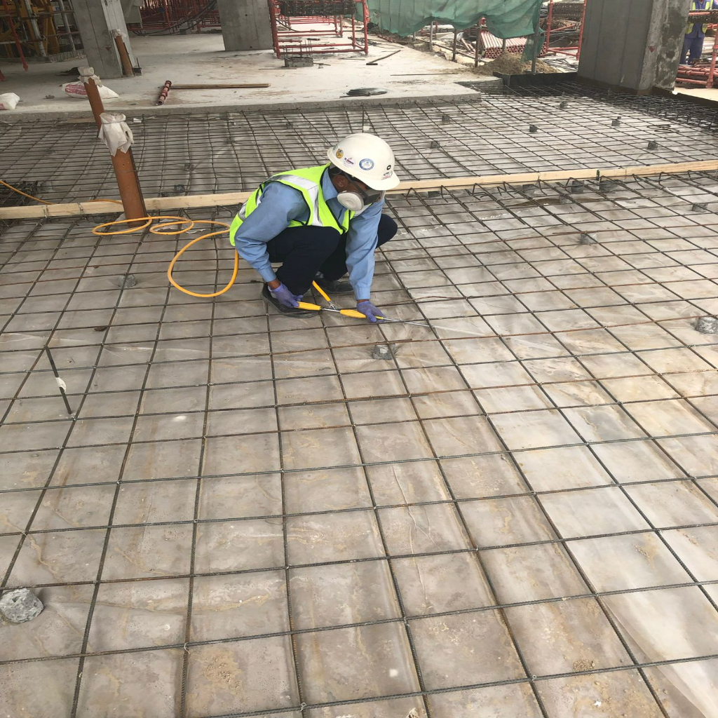 Seddiqi Holding HQ facade at dusk